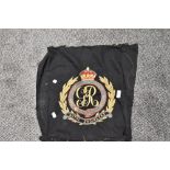 An embroidered Royal Engineers emblem with GR cipher, unframed with some deterioration to edges.