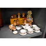 A dolls tea set and a selection of wooden toys and animals