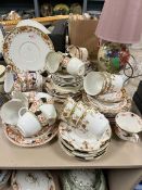 A selection of mixed antique ceramics, amongst which are cups and saucers and plates to include