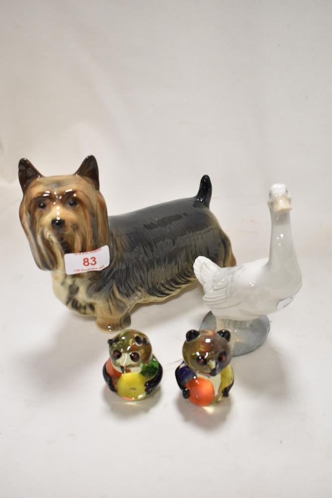 A Yorkshire terrier dog study, a Nao swan and two glass panda studies