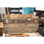 A vintage wooden advertising crate, name JF Bomford-Springhill