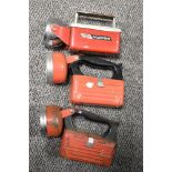 Three vintage red bodied torches