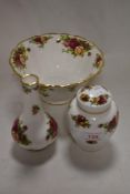 A trio of Royal Albert Old Country Roses, to Include bud vase, ginger jar and footed bowl.