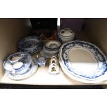 A selection of vintage and antique blue and white ware, platters, plates and more to be included.