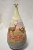 A late Victorian Royal Doulton Joseph Hancock Lucian ware vase hand decorated with deer and highland