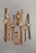 Ten ladies gold tone watches, various makes and styles.