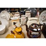 A mixed lot of ceramics including late 19th century tea pot and trivet with relief design reading'