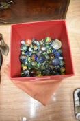 A quantity of glass marbles, various sizes, lot to include draw-string bag