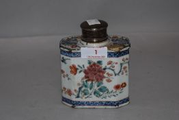 A late 18th century Chinese export porcelain tea caddy decorated with famille rose design and HM