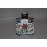 A late 18th century Chinese export porcelain tea caddy decorated with famille rose design and HM