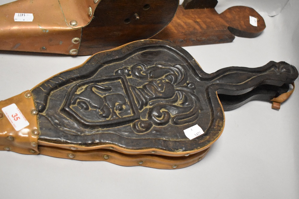 Two pairs of bellows one of Westmorland design and a pair of leather and carved oak in traditional - Image 2 of 2