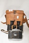 A pair of Watson & Sons ltd Binocular Prismatic no.3 x6 binoculars 1916 with leather case and a