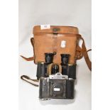 A pair of Watson & Sons ltd Binocular Prismatic no.3 x6 binoculars 1916 with leather case and a