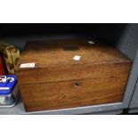 An Edwardian writers slope box, having fitted interior with a mahogany case. Case being worn and