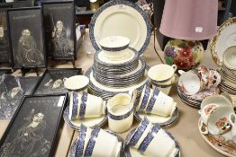 A Minton 'Mandeville' partial dinner service having cream ground with blue band and foliate details,