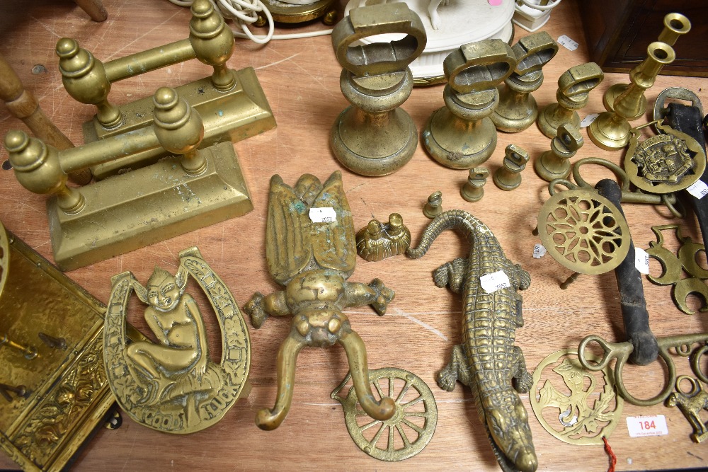 A large selection of brass wares, to include graduating bell weights, beetle boot jack, Martingales, - Image 2 of 3