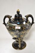 A Victorian samovar having ceramic body with Aesthetic floral design