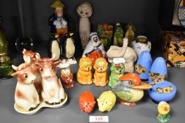 A mixed lot of novelty figures and studies, including pig salt and pepper set, Goebel cow cruet