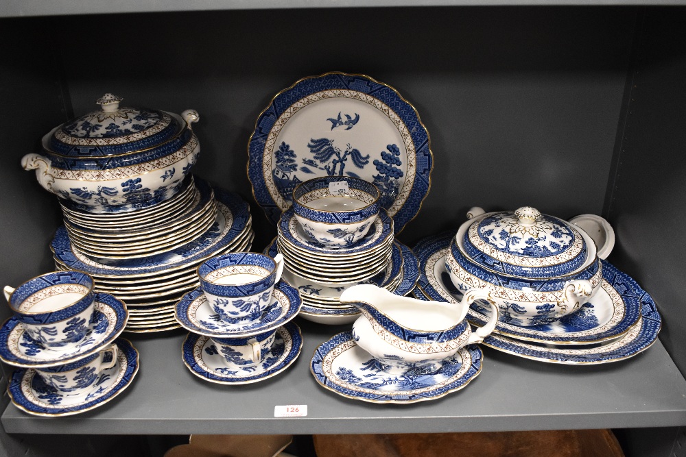 A large collection of Booths Real Old Willow A8025 dinner service, to include tureens, plates,