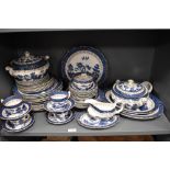 A large collection of Booths Real Old Willow A8025 dinner service, to include tureens, plates,