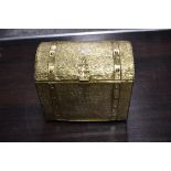 A mid century coal bucket in the form of a brass treasure chest