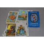 A set of 20th century Rider Tarot fortune telling cards, appears complete with instructions