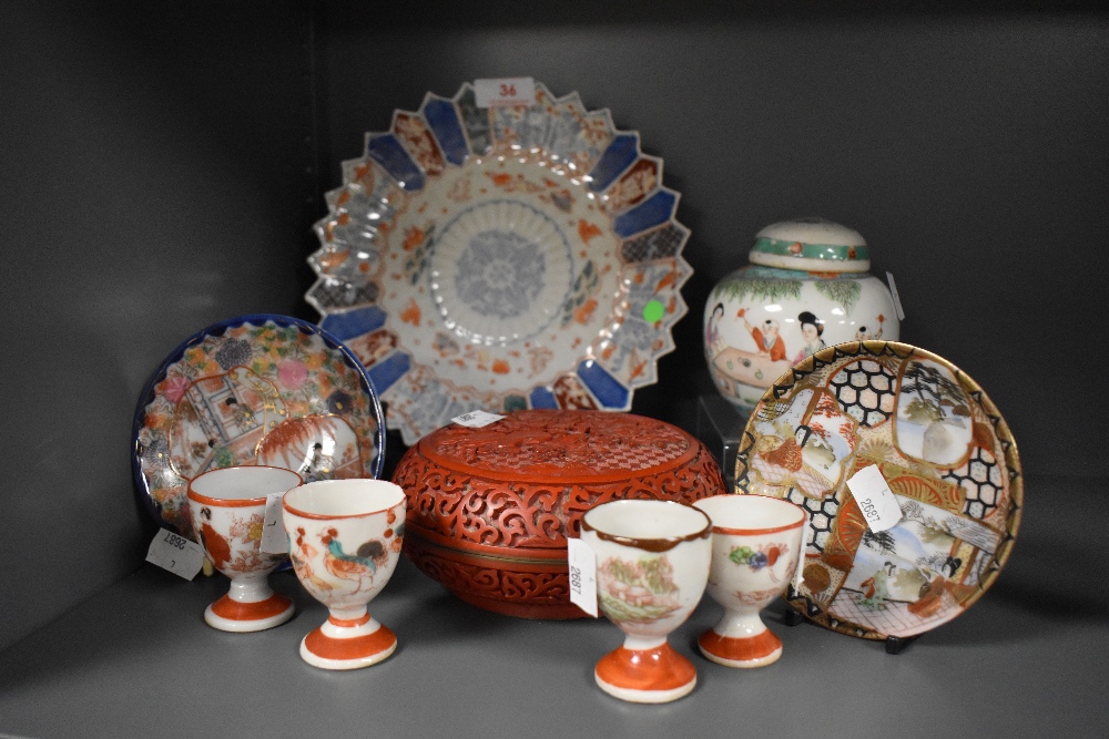 A selection of oriental items including porcelain plate and cinnabar lacquer box