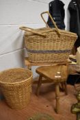 A woven wicker picnic hamper, woven wicker waste paper basket, crochet stool and three legged