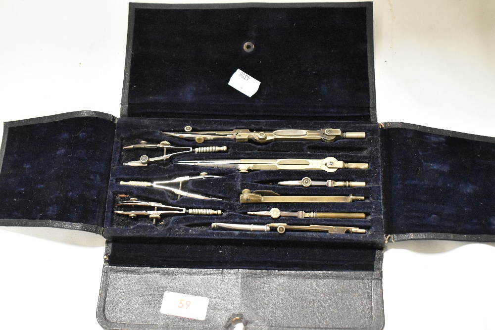 An early 20th century geometry set in fitted case, appears complete.