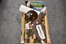 A Box of mixed Australian interest items including books, boomerangs and more.