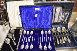 A selection of vintage flatware in boxes, knives and forks, spoons and sugar nips to be included.