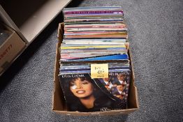 A box of around one hundred mixed vinyl LP records, Meat Loaf, The Rolling Stones, Elton John and