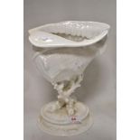 A Victorian Wedgwood table centre decoration of a Conch shell perched on Coral. In good condition no