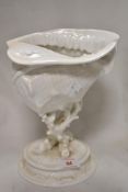 A Victorian Wedgwood table centre decoration of a Conch shell perched on Coral. In good condition no