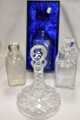 Four clear cut glass decanters including an Edinburgh Crystal glass etched with National Blood