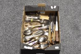 A mixed box of cutlery including horn and hoof handled forks, knives and similar.