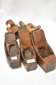 A selection of antique woodwork or carpenters planes including Robert Sorby boat and block planes