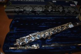 A Trevor James flute , model TJ10xIII, with plush case and box