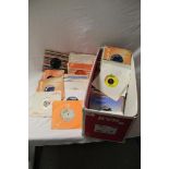 A large box ( 130 ) of singles with the bulk being 1960's and in company bags - some rare titles and