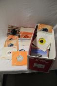 A large box ( 130 ) of singles with the bulk being 1960's and in company bags - some rare titles and