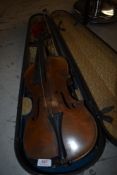 A tradtional violin, having one piece back, interior paper label, Salisbury 1750, in hard case