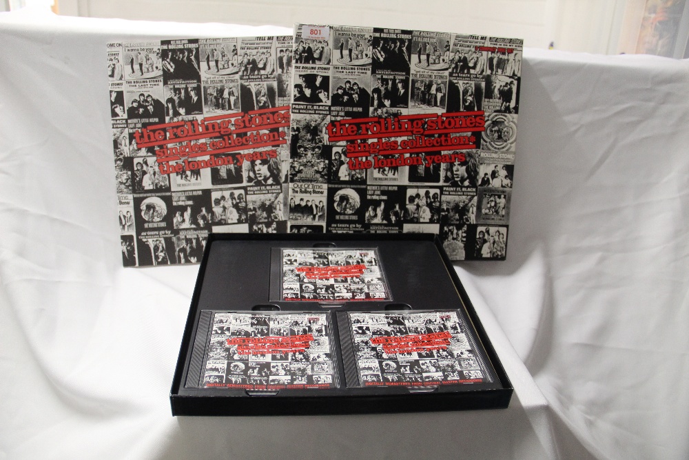 A box of three compact discs - London years - The Rolling Stones - singles - a great collection in