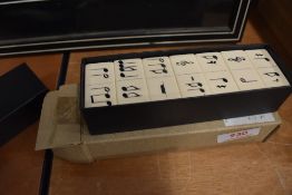 A set of novelty 'musical' dominoes