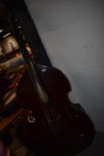 A double bass, back length approx 113cm, labelled Gear for music but with adaptions inclduing Selmer