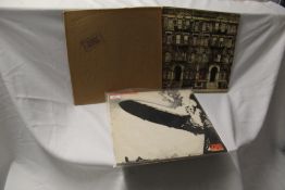 A three album Led Zeppelin lot with an red / purple Atlantic press of the debut