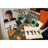 A lot of Beatles and related vinyl albums and three seven inch singles- the Abbey Road is the French