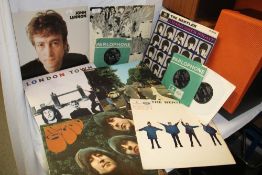 A lot of Beatles and related vinyl albums and three seven inch singles- the Abbey Road is the French