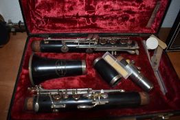 A Carl Fischer Artist clarinet in plush lined case