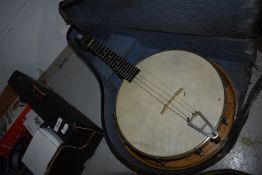 A vintage banjo ukulele, labelled Jedson