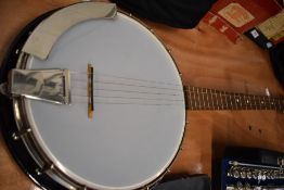 An unbranded 5 string banjo